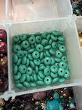 Turquoise-colored coins